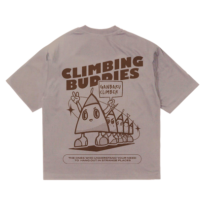 Back of oversized thick brown 230gsm cotton nobori tee shirt with a playful design in dark brown. Design features triangles standing in a line with different facial expressions. Above them text reads "climbing buddies"